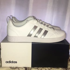 Brand new Adidas sneakers. Never worn.